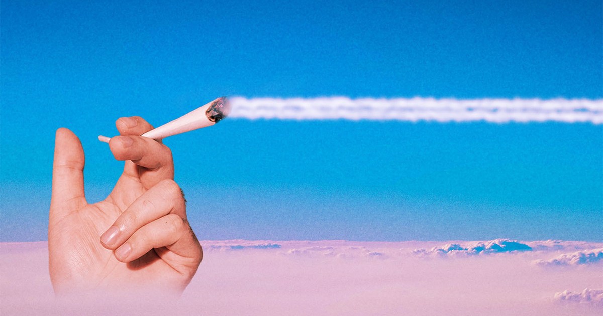 A hand holding a joint above the clouds while the smoke trails across the sky. Here's our guide to getting stoned while flying on a plane.