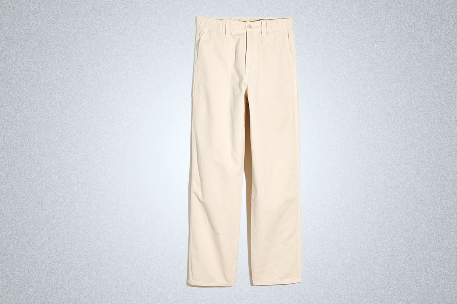 a pair of off white Everyday Pants from Madewell on a grey background