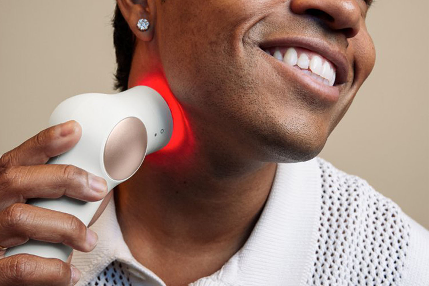 A therapeutic device that a model uses on her neck