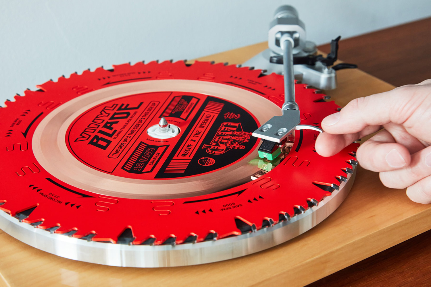 a sawed vinyl on a record player