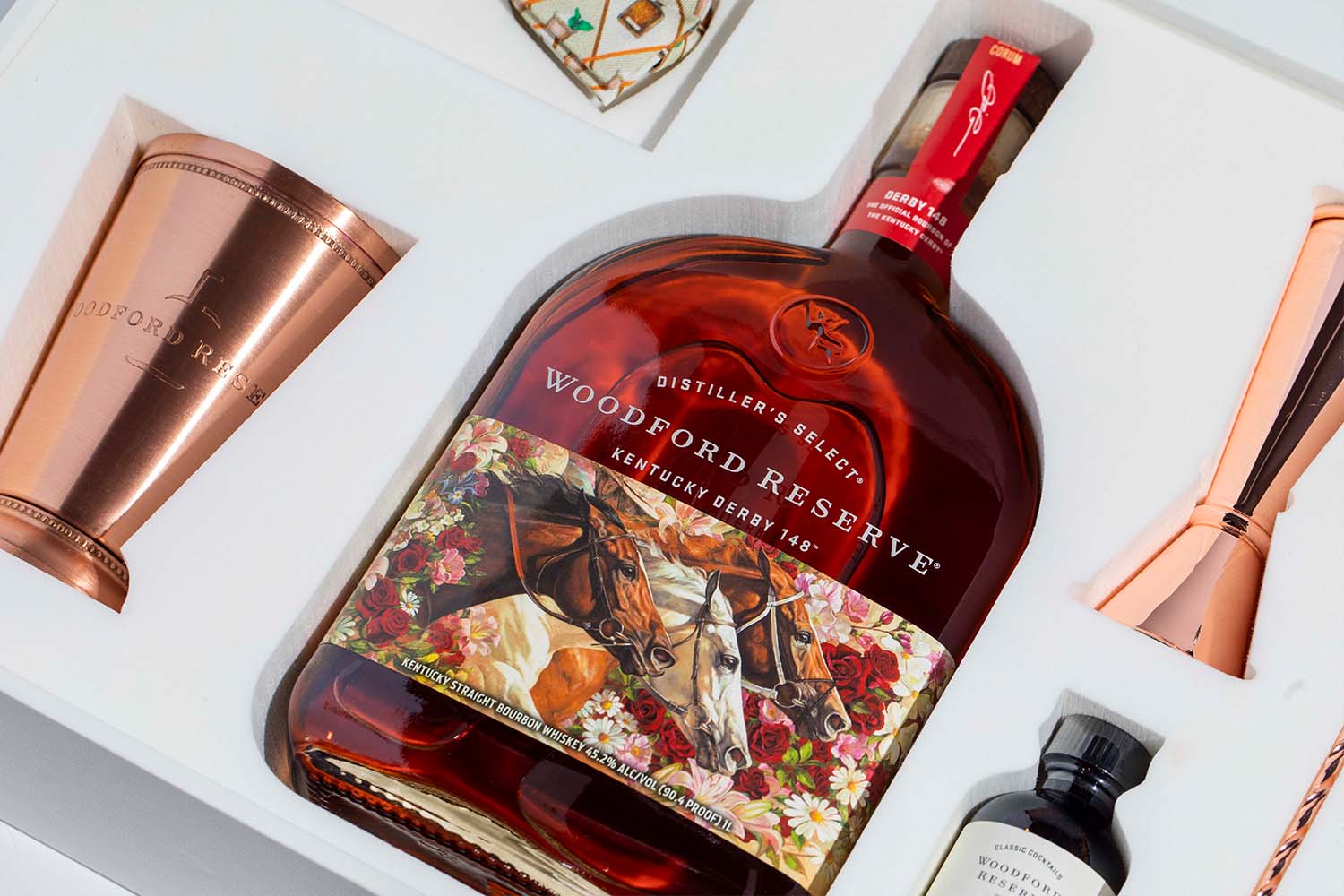 a bottle of Woodford reserve with horse decoration