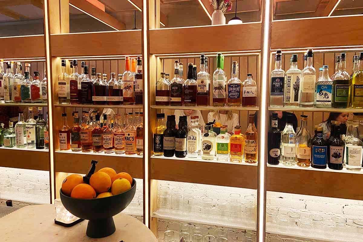 A view of the backbar at Eavesdrop, which relies heavily on local spirits
