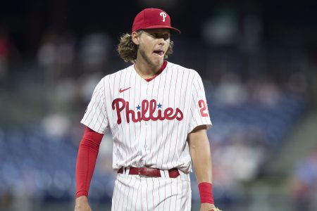 Alec Bohm of the Philadelphia Phillies reacts after committing an error. Should he have apologized for cursing the city on Monday night?