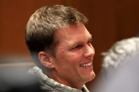 Tom Brady, quarterback of the Tampa Bay Buccaneers, at a press conference for new head coach Todd Bowles