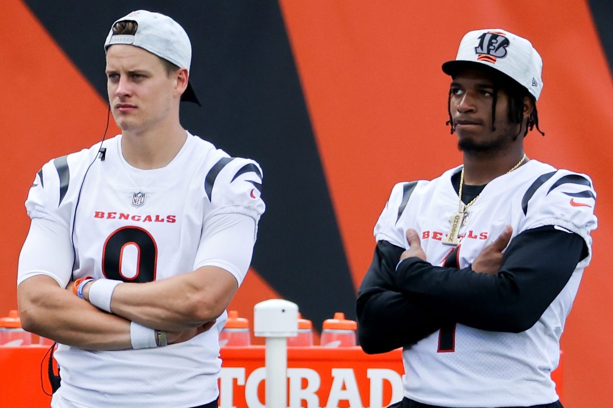 Joe Burrow and Ja'Marr Chase of the Cincinnati Bengals look on from the sidelines