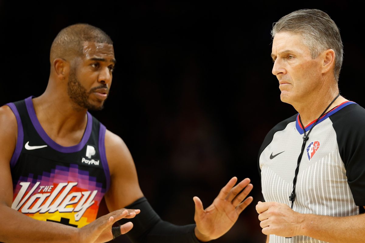 Referee Scott Foster reacts to Chris Paul of the Phoenix Suns during an NBA game
