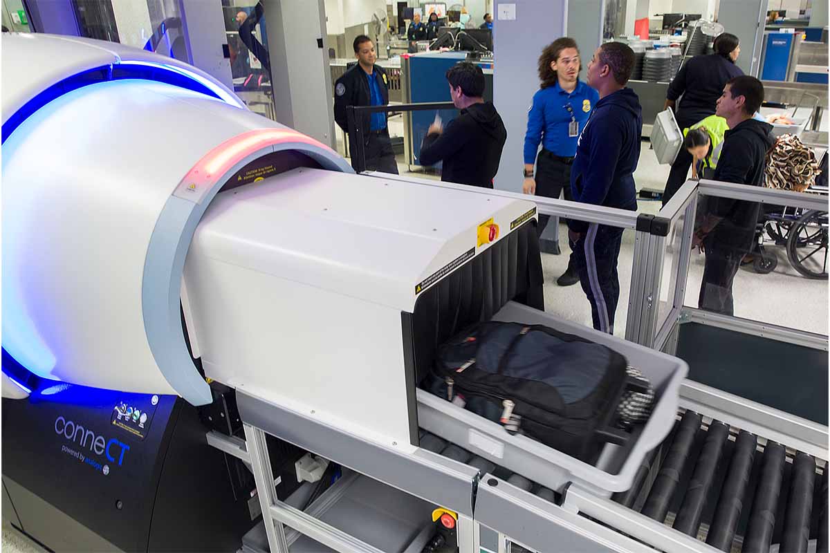 Carry on bags are seen entering the Transportation Security Administration (TSA) new 3-D scanner at the Miami International Airport. new versions of these machines are slowing down security lines at some airports.