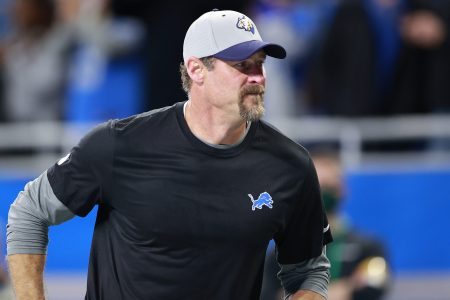 Head coach Dan Campbell of the Detroit Lions walks off the field after a win