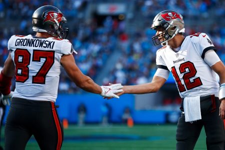 Tom Brady and Rob Gronkowski react after a touchdown. Gronkowski recently told Jimmy Kimmel he thinks Brady will play until he's 50.
