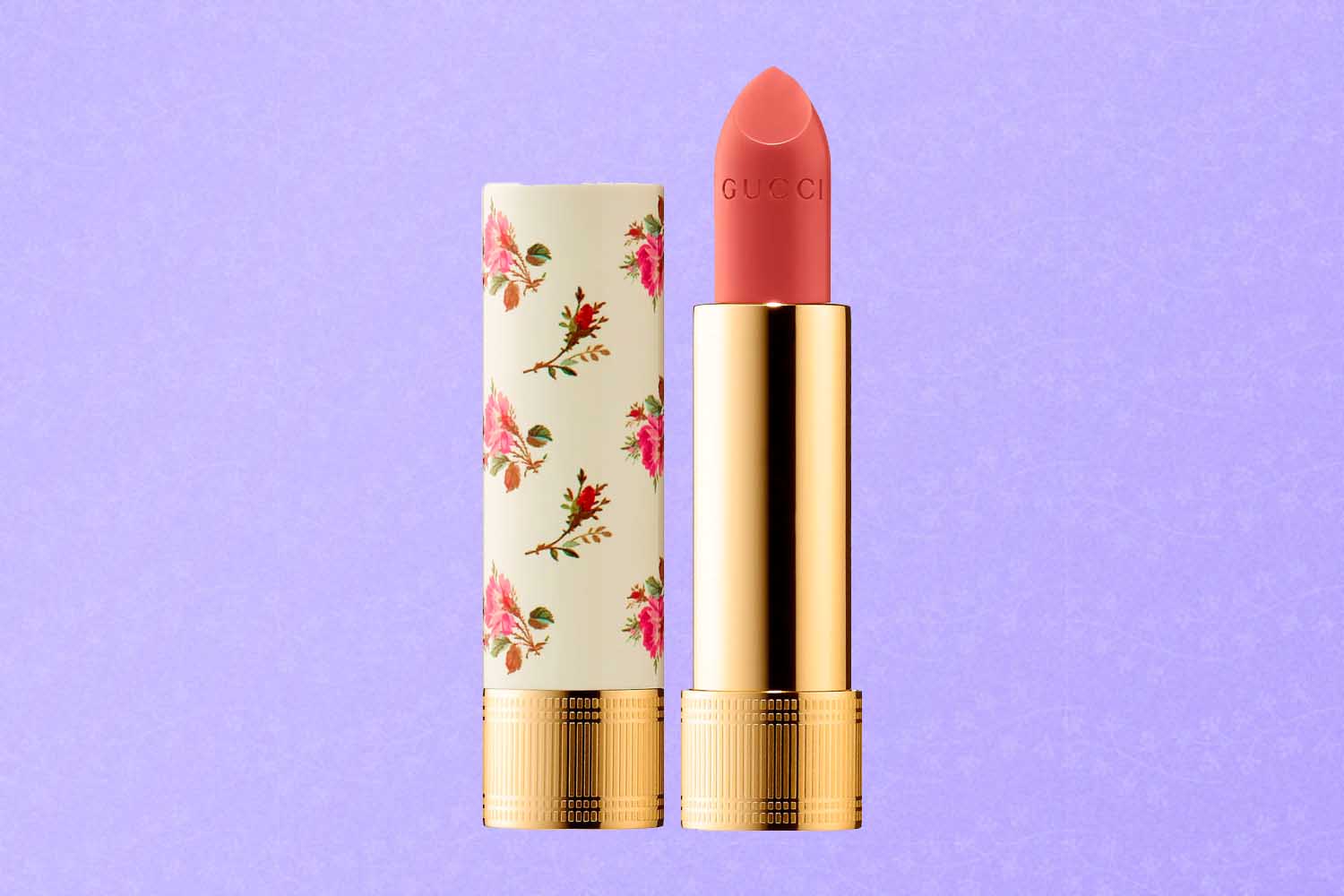 A floral Gucci lipstick, a perfect Mother's Day gift for 2022, on a purple background.
