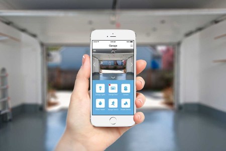 A hand holding up a phone with the Insteon app highlighted. The smart home company abruptly went under this month, putting customers in a bind.