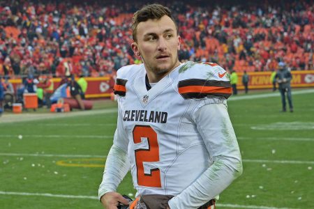 Ex-NFL quarterback Johnny Manziel walks off the field in 2015