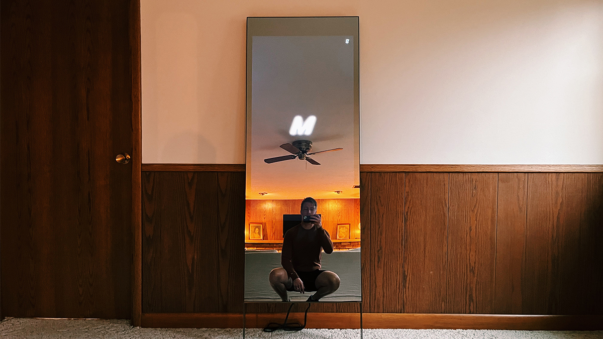 A photo of the Lululemon Studio Mirror loading screen on the home fitness exercise mirror. I tested and reviewed the model to see whether it's worth buying.