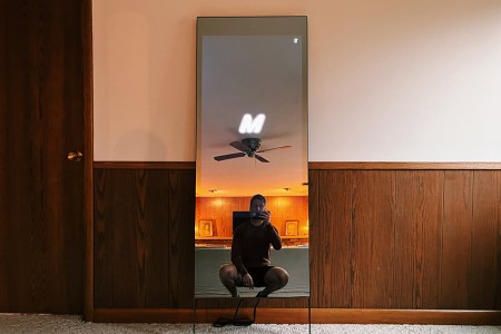 A photo of the Lululemon Studio Mirror loading screen on the home fitness exercise mirror. I tested and reviewed the model to see whether it's worth buying.