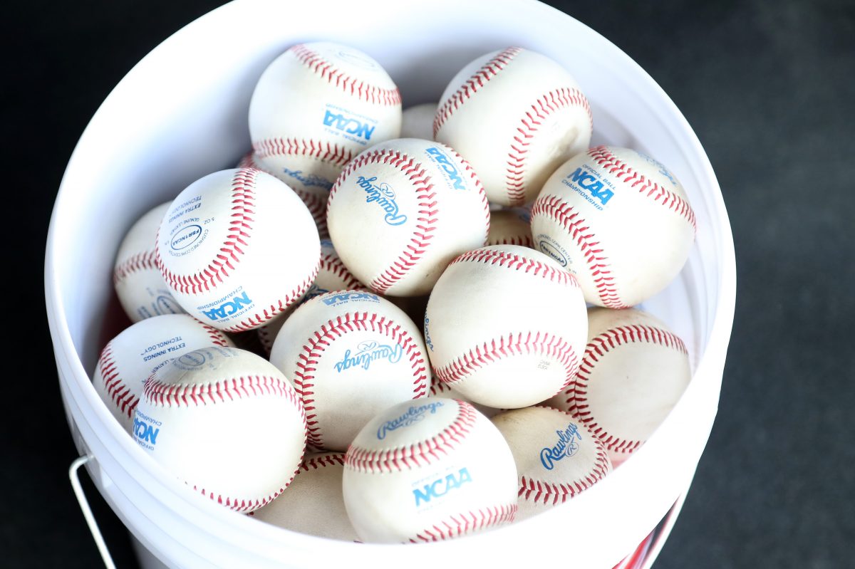 A bucket of NCAA tournament baseballs