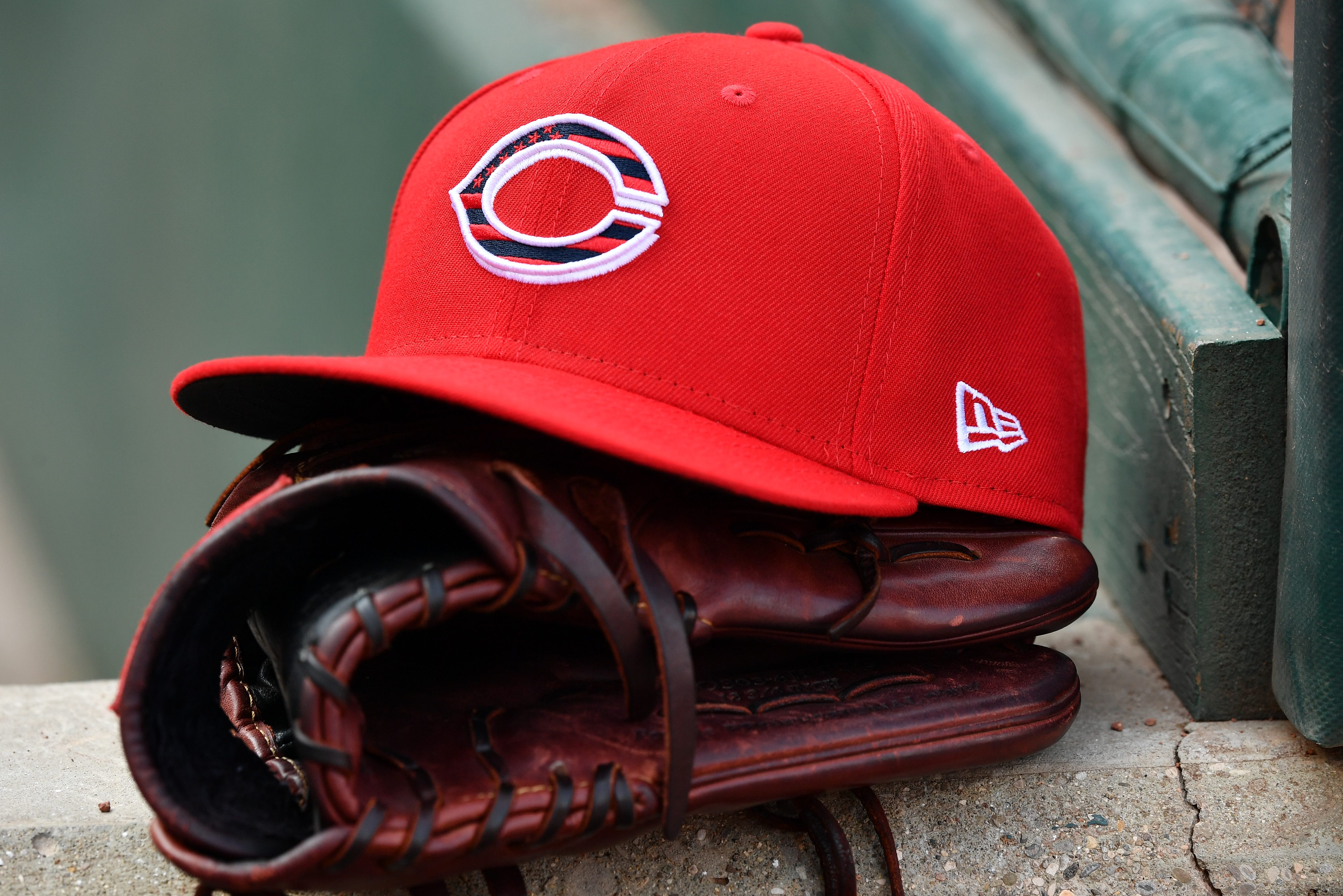 A close up view of a Cincinnati Reds cap with special logo