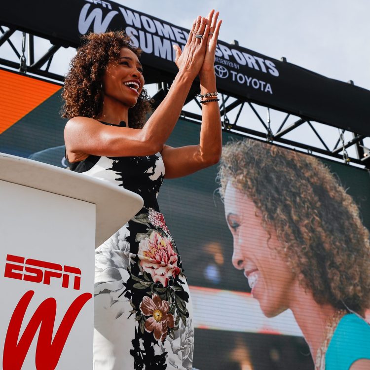 Sage Steele presents opening remarks at the espnW Summit in 2018. The ESPN anchor recently sued the Worldwide Leader for sidelining her after her own comments about Barack Obama's race and COVID-19 vaccine mandates.