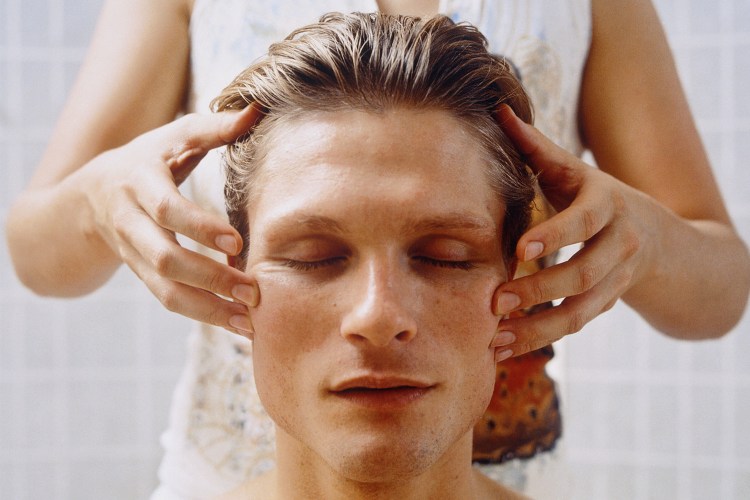 man getting scalp massage