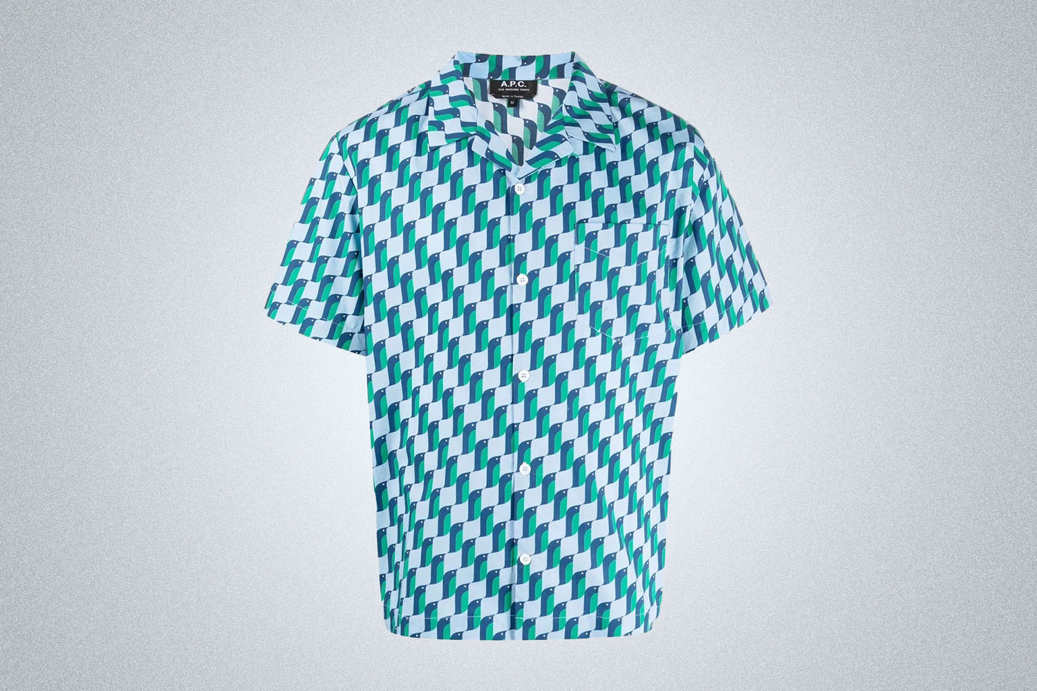 a mutli-checked blue, green and white short sleeve button up shirt from A.P.C. on a grey background