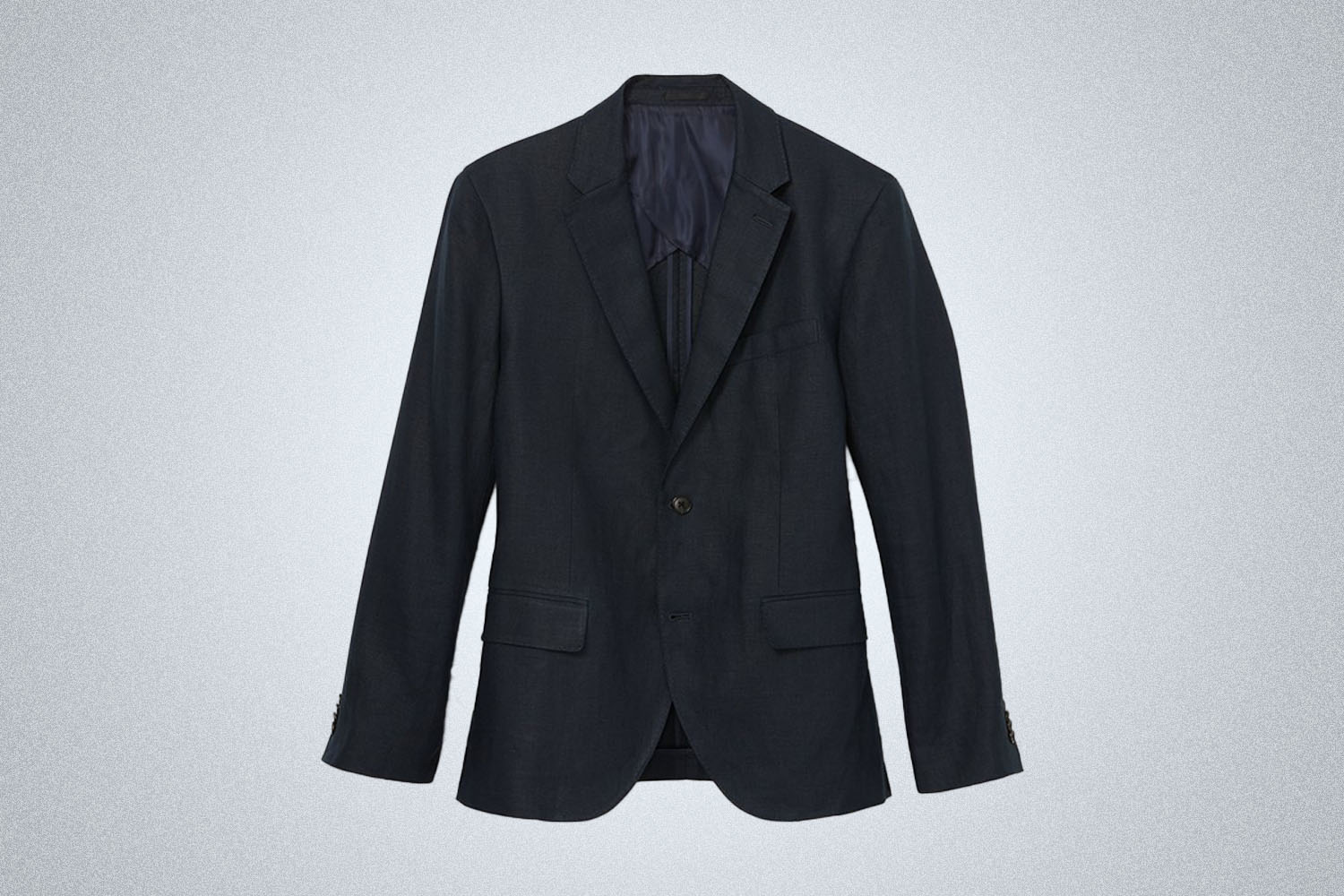 a pair of blue linen blazer from Club Monaco on a grey background