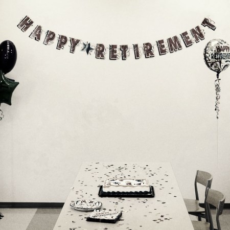 A retirement party in black and white.