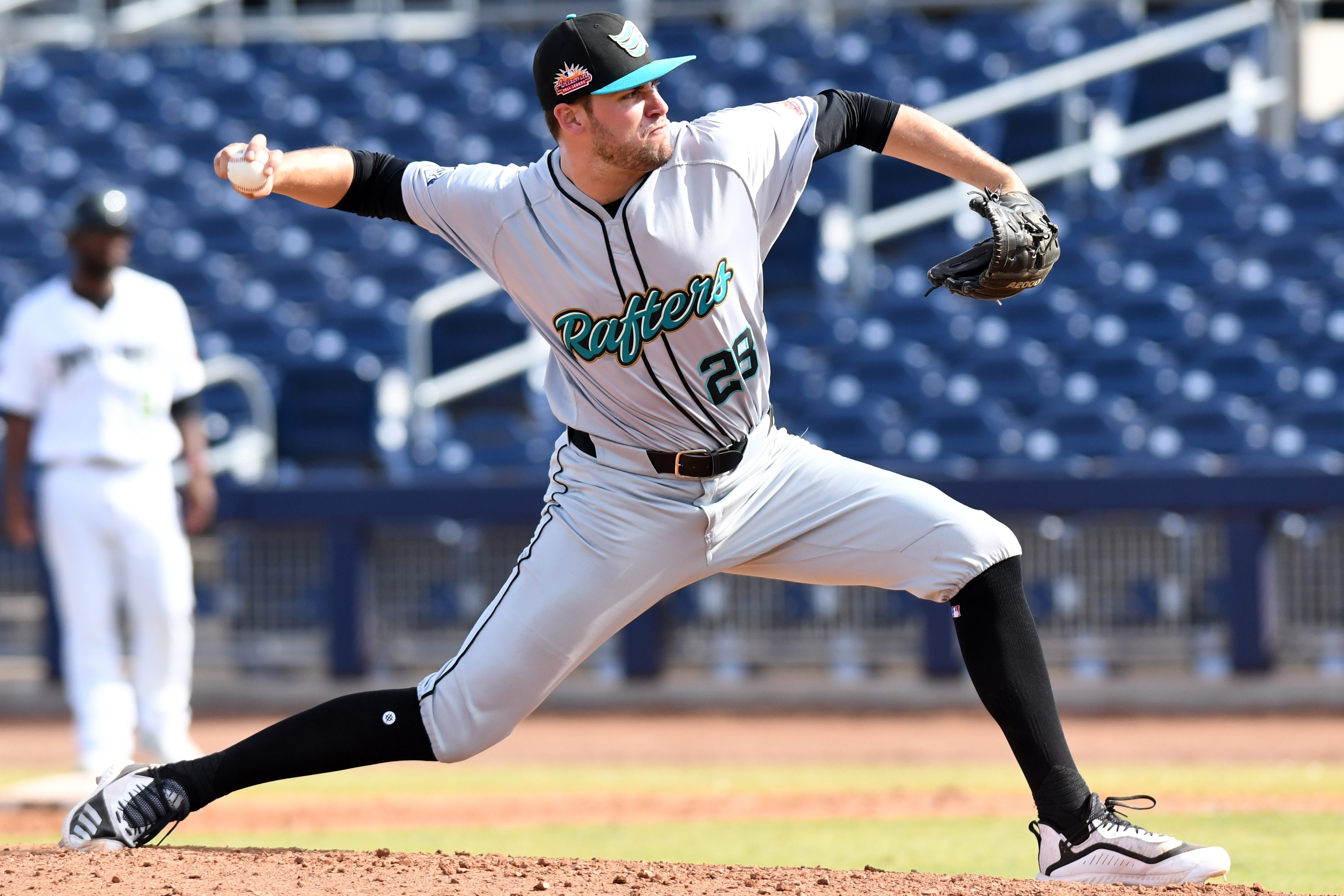 Simon Rosenblum-Larson pitches for the Salt River Rafters in 2019 in Arizona