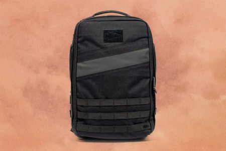 A rucksack against an orange background.