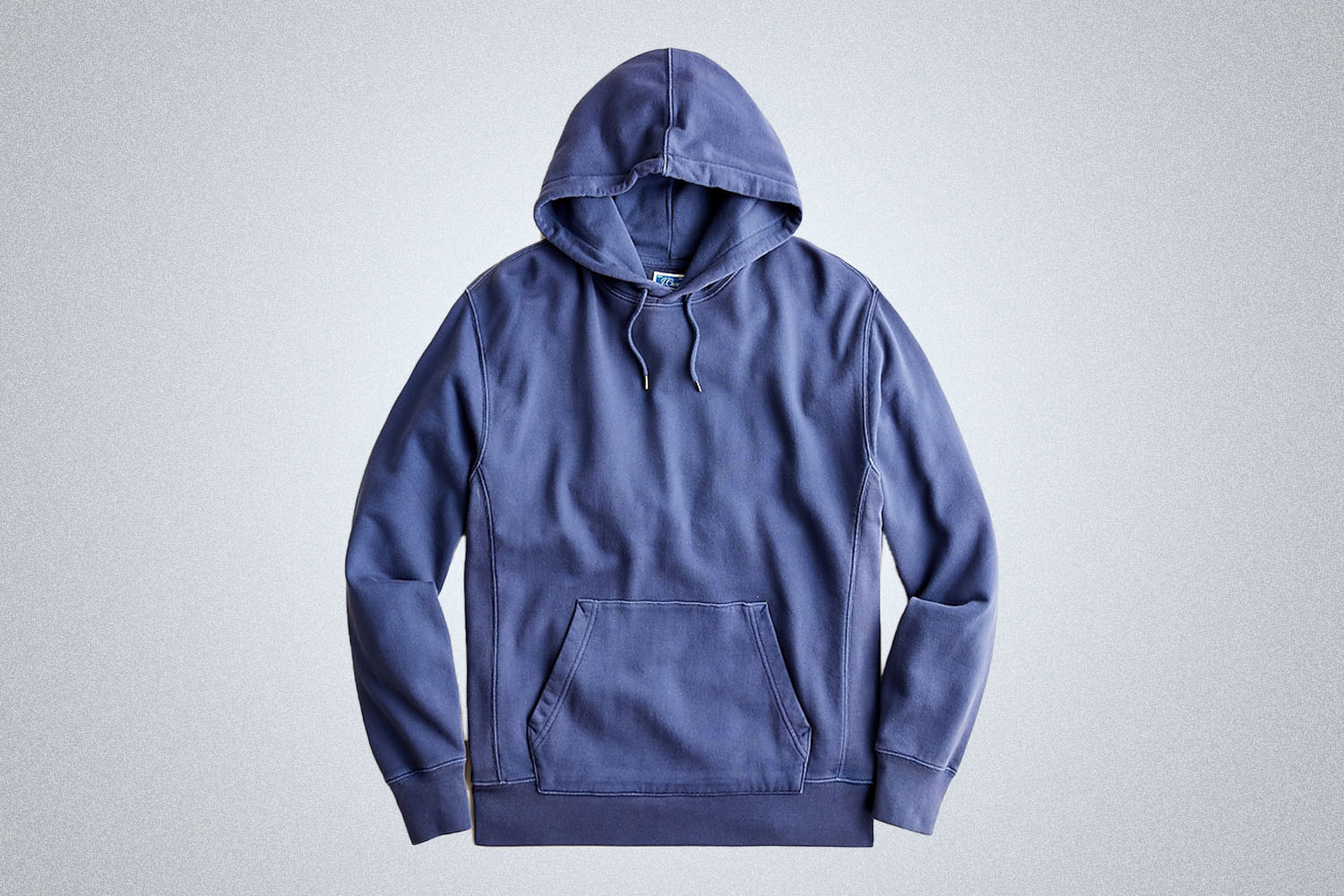 a blue washed hoodie on a grey background