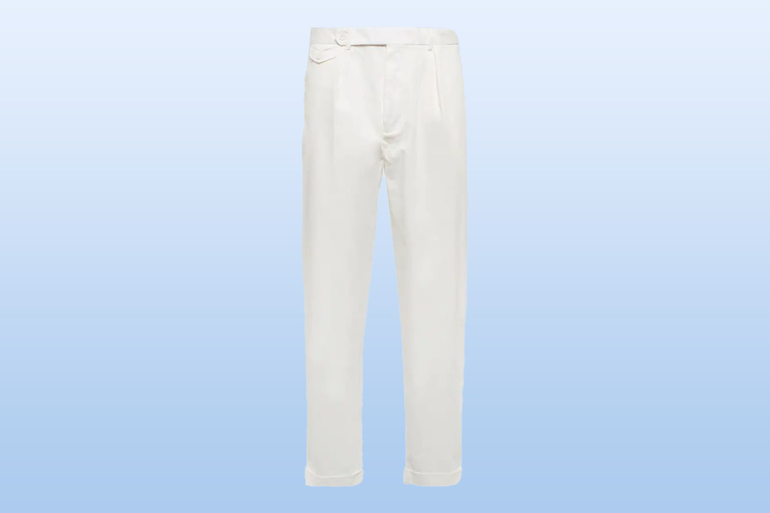 Pair of white trousers from mytheresa on a light blue background