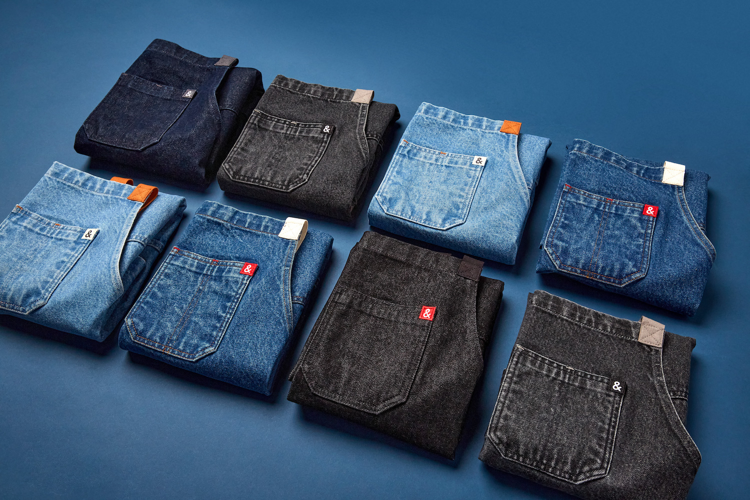 a collage of denim aprons from Hedley & Bennett on a light blue background