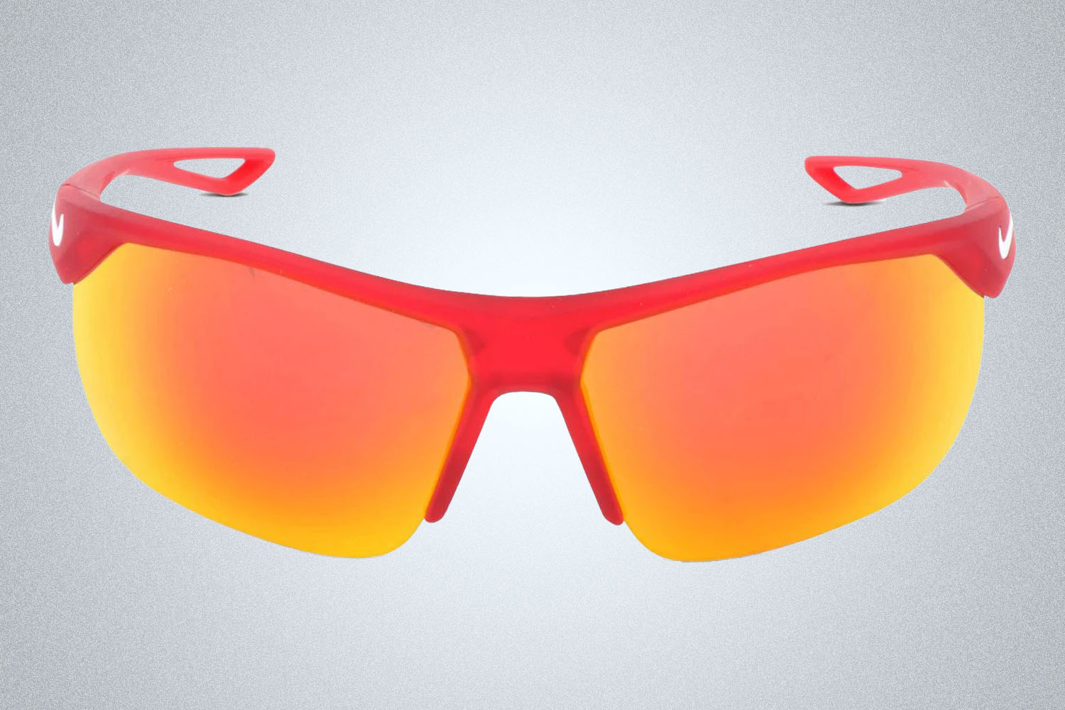 A pair of sunglasses from GlassesUSA on a grey background