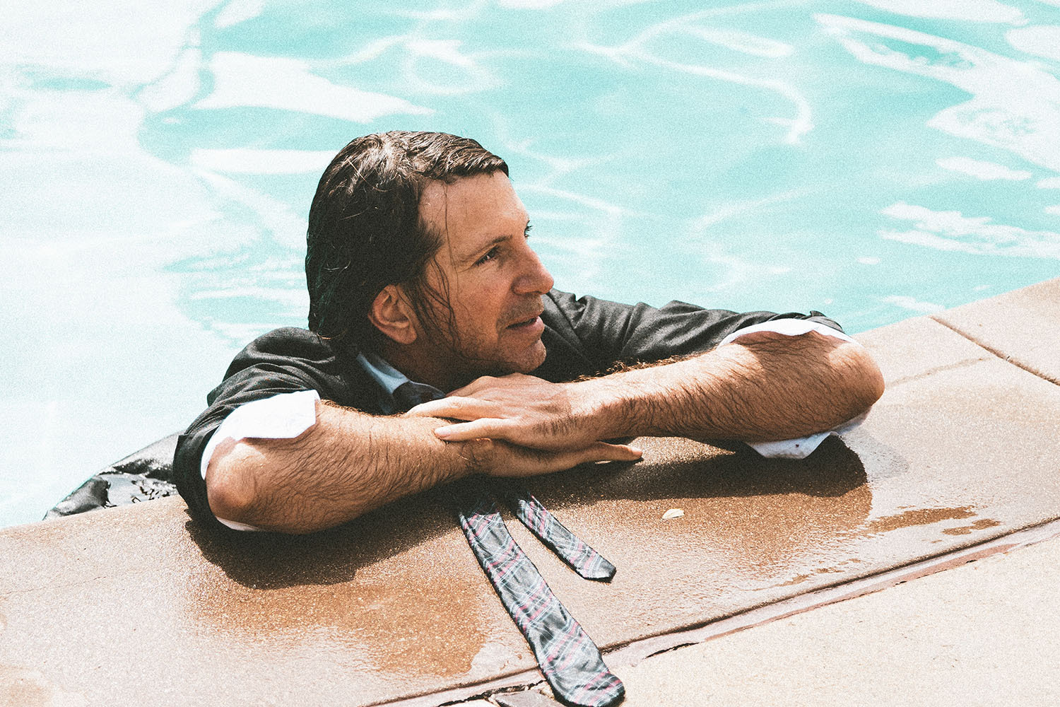 DJ Poolside in a swimming pool