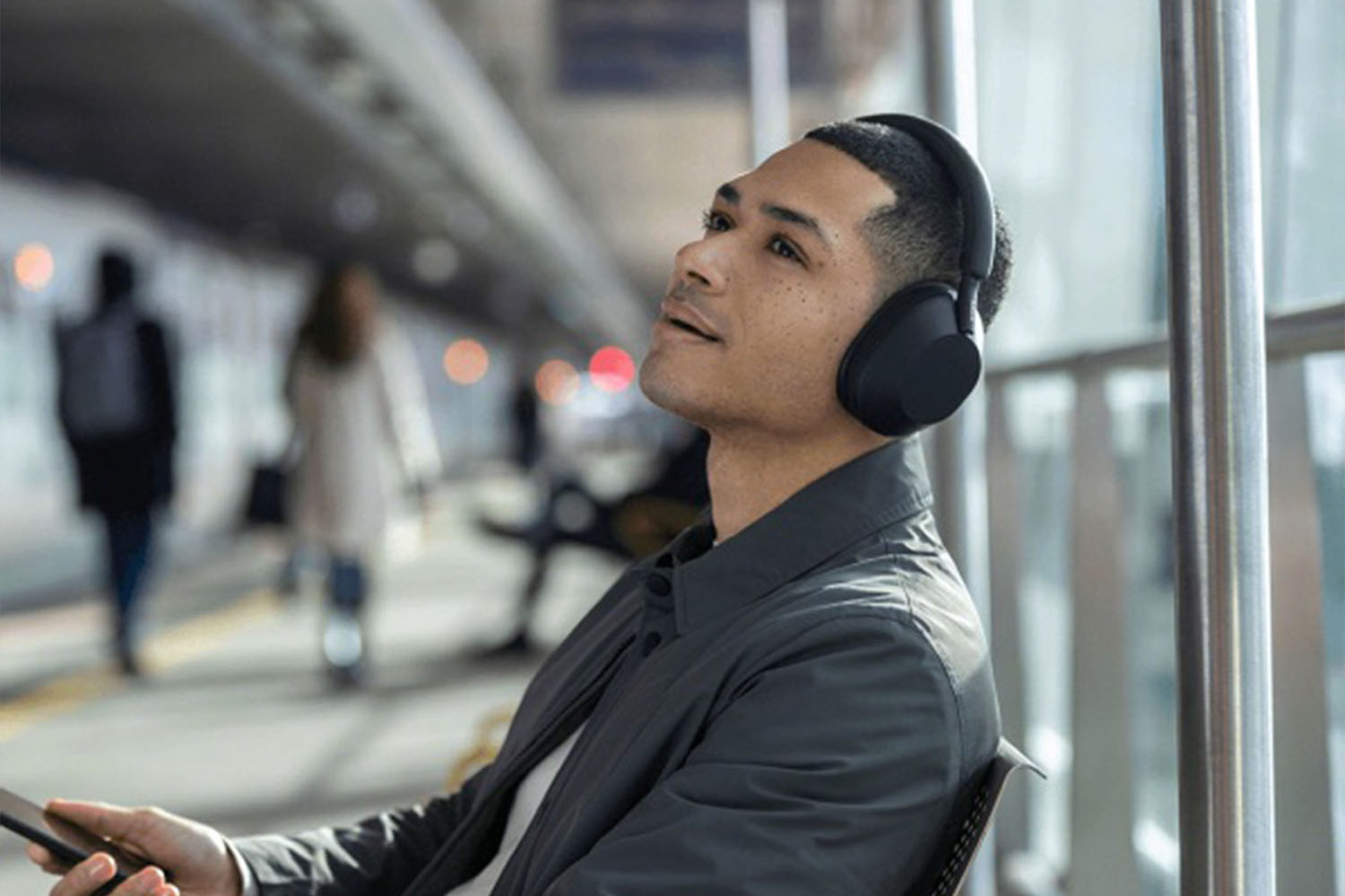 A model wearing the new Sony wireless headphones.