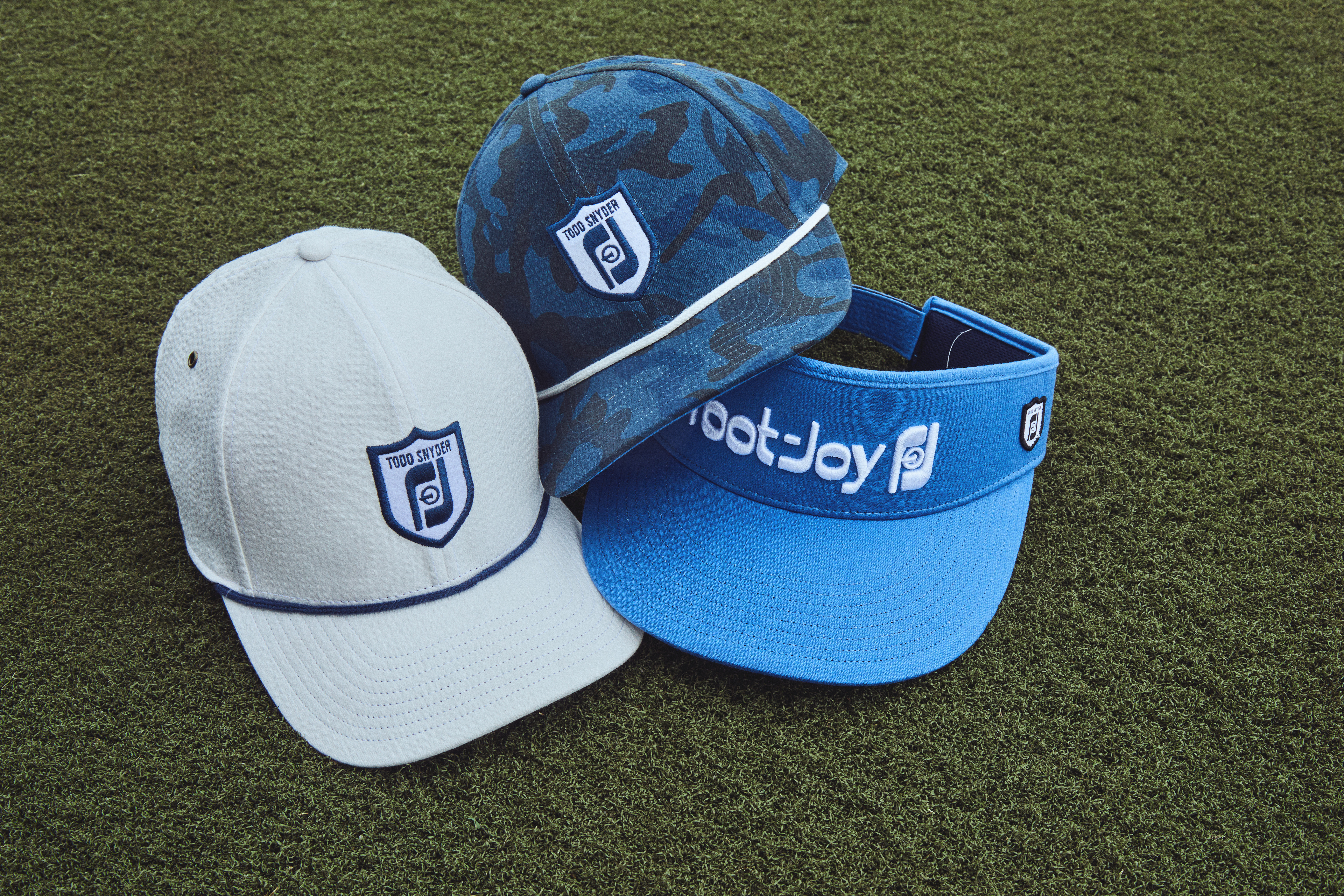 Made from a seersucker-spandex blend, the caps feature the vintage FootJoy “golf and tee” logo