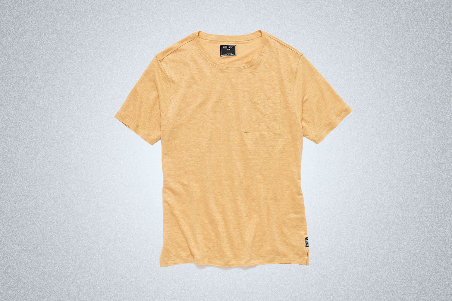 a yellow tee from Todd Snyder on a grey background