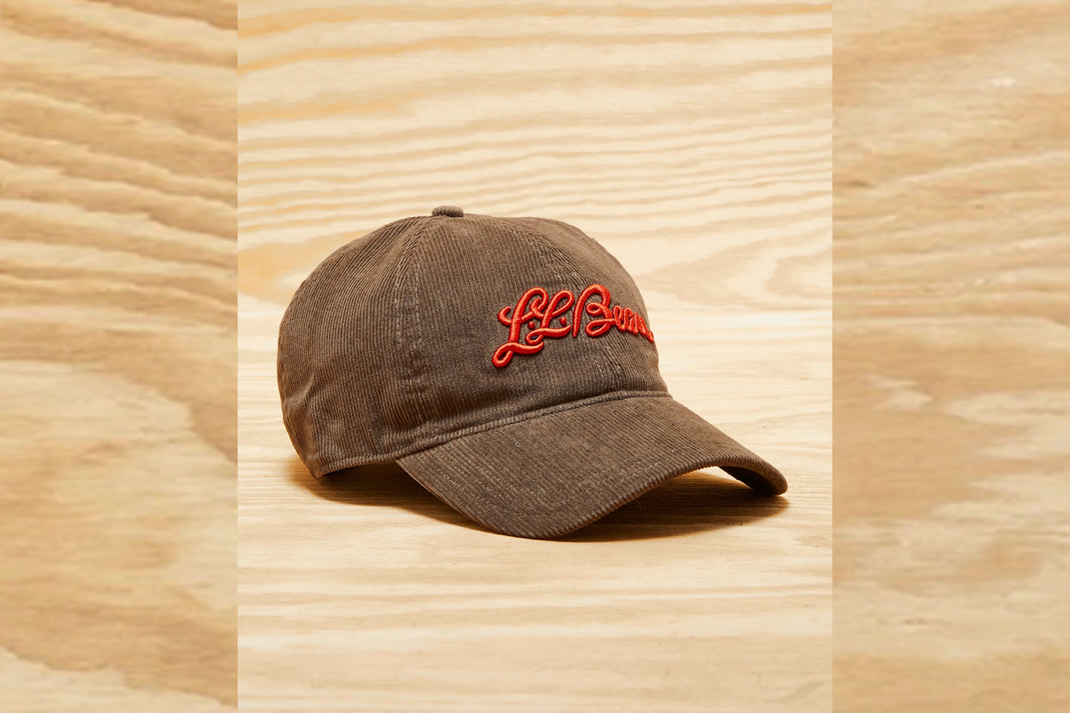 a Todd Snyder x L.L. Bean Cap on a wooden background