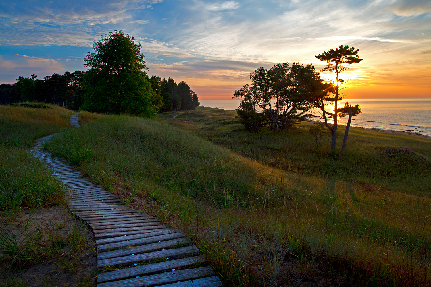Boardwalk in Kohler-Andrae State Park in Sheboygan, Wisconsin offers camping and 2.5 miles of sandy beach.