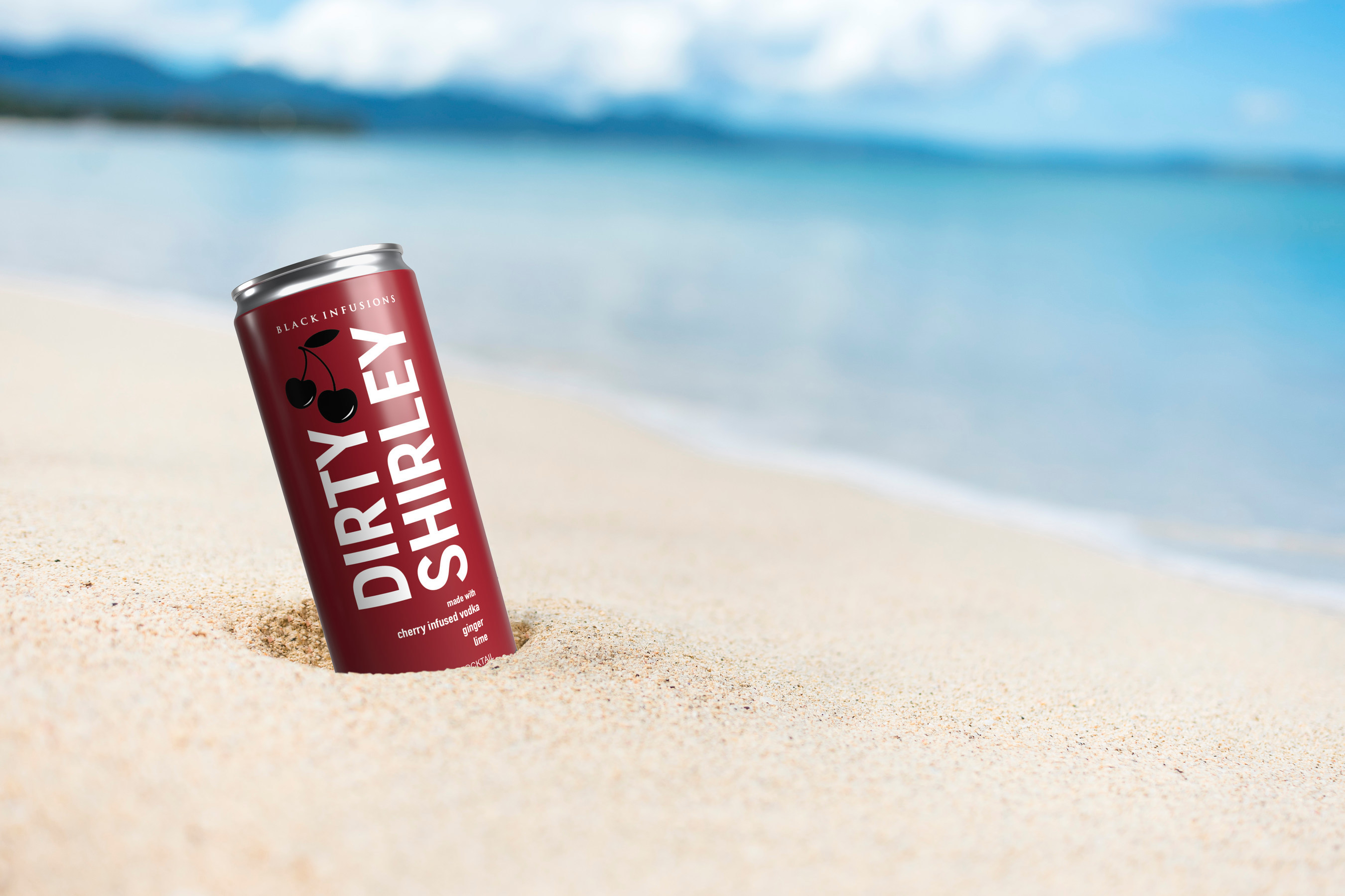 A Dirty Shirley can in the sand