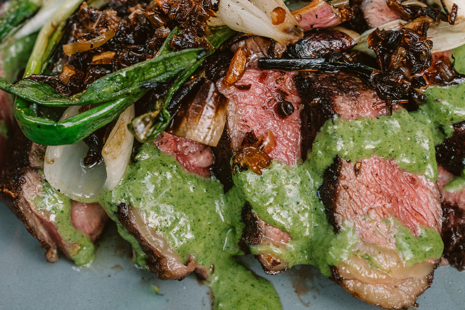 Wagyu First Light Rib Steak with Creamed Nettles and Roasted Spring Onions