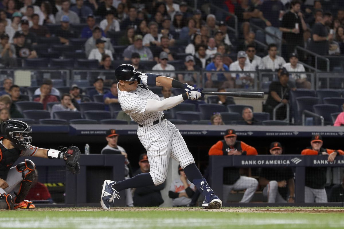 Aaron Judge of the New York Yankees hits a two-run home run against the Baltimore Orioles