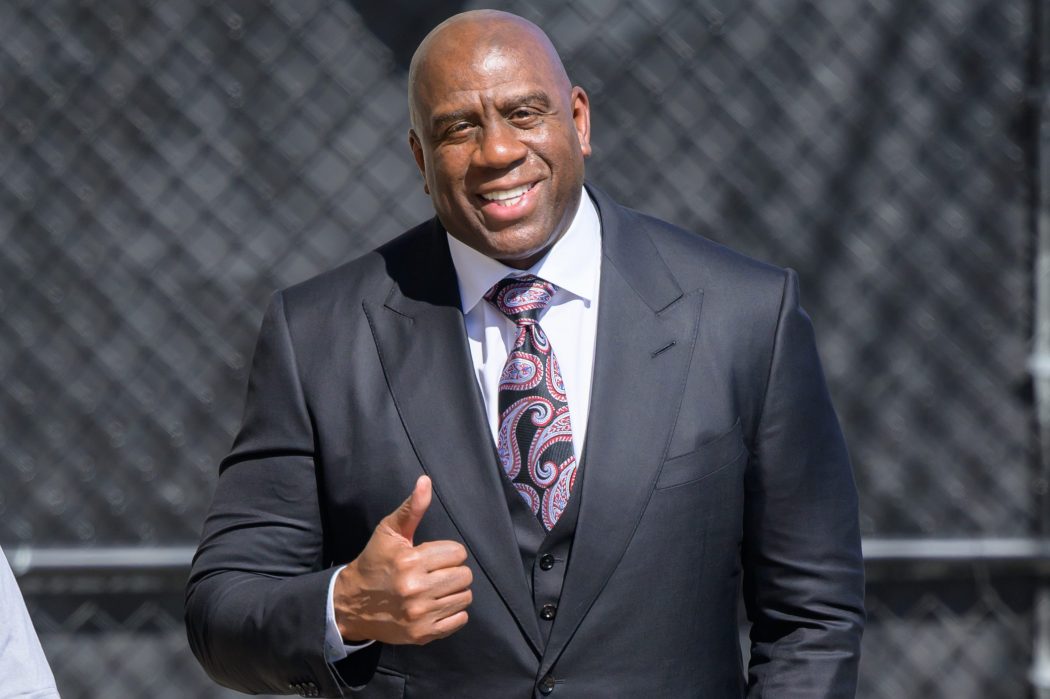 Magic Johnson is seen at "Jimmy Kimmel Live" on April 21, 2022. According to reports, Johnson has joined a team that is looking to buy the Denver Broncos.
