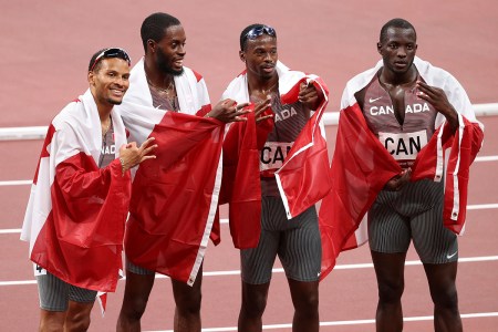 Canada's track team poses at the Tokyo Games.