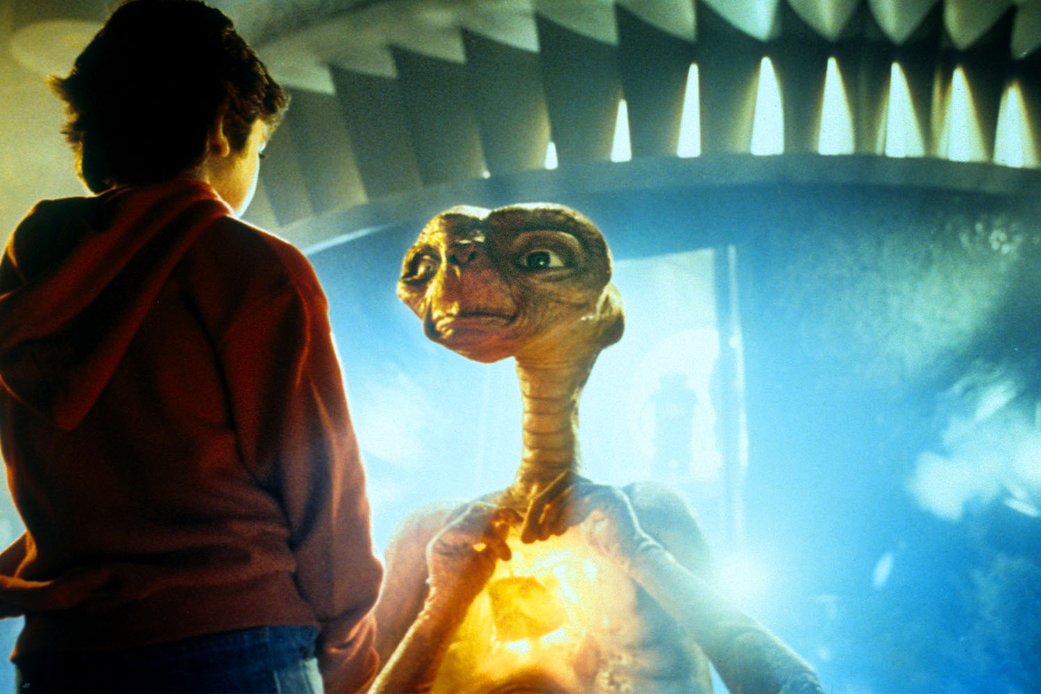 Elliott (Henry Thomas) and E.T. in a scene from the movie E.T., The Extra-Terrestrial. E.T. is one of 10 films that made 1982 the best movie summer ever.