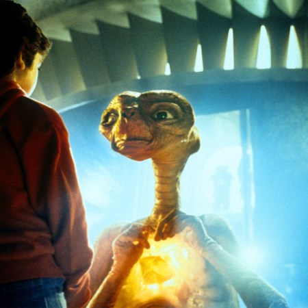 Elliott (Henry Thomas) and E.T. in a scene from the movie E.T., The Extra-Terrestrial. E.T. is one of 10 films that made 1982 the best movie summer ever.