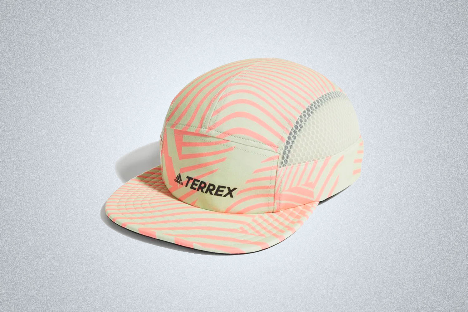a multi-colored hat with the "terrex" logo across the front from Adidas on a grey background