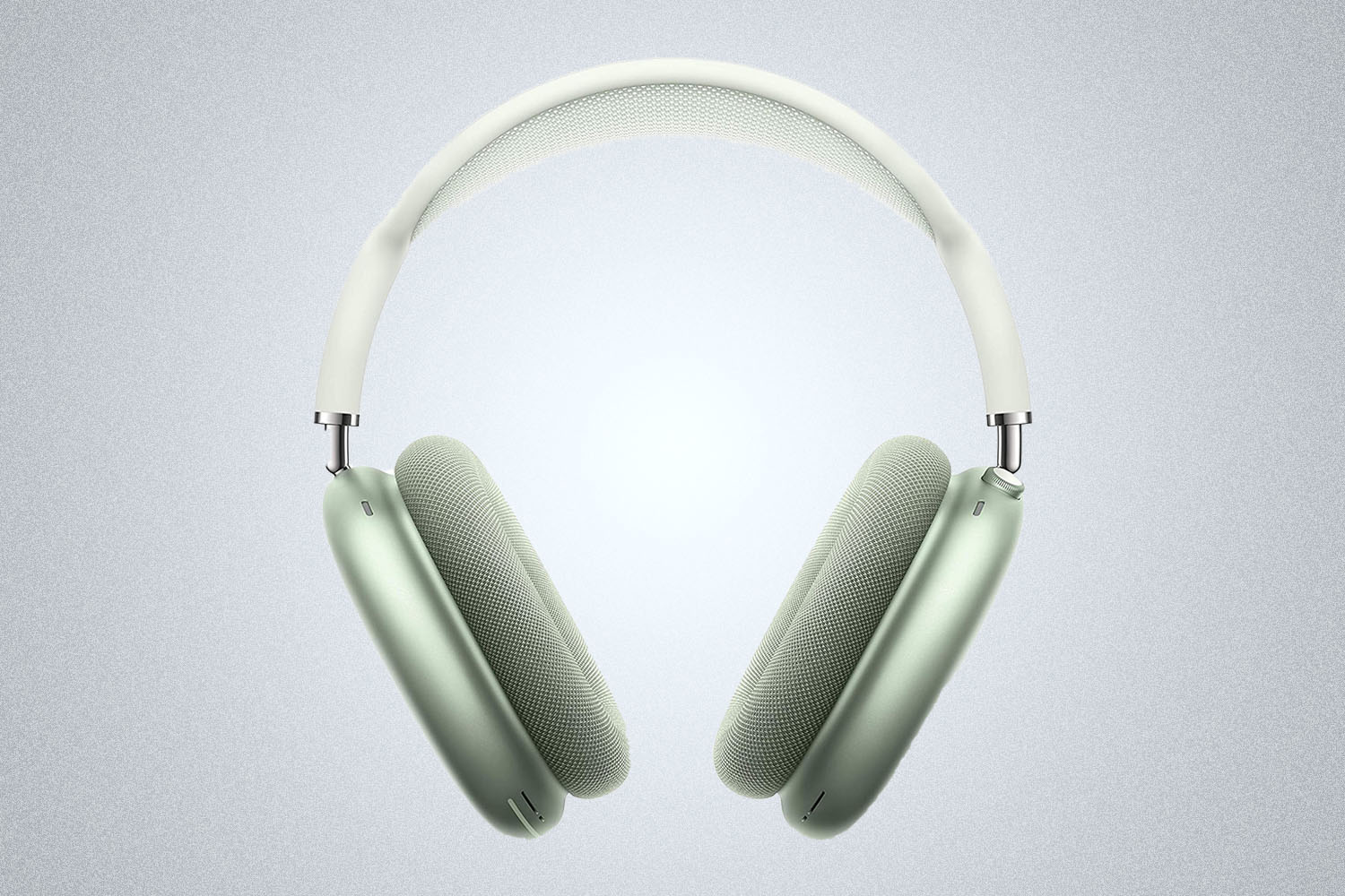 a pair of green Apple AirPod Max headphones on a grey background