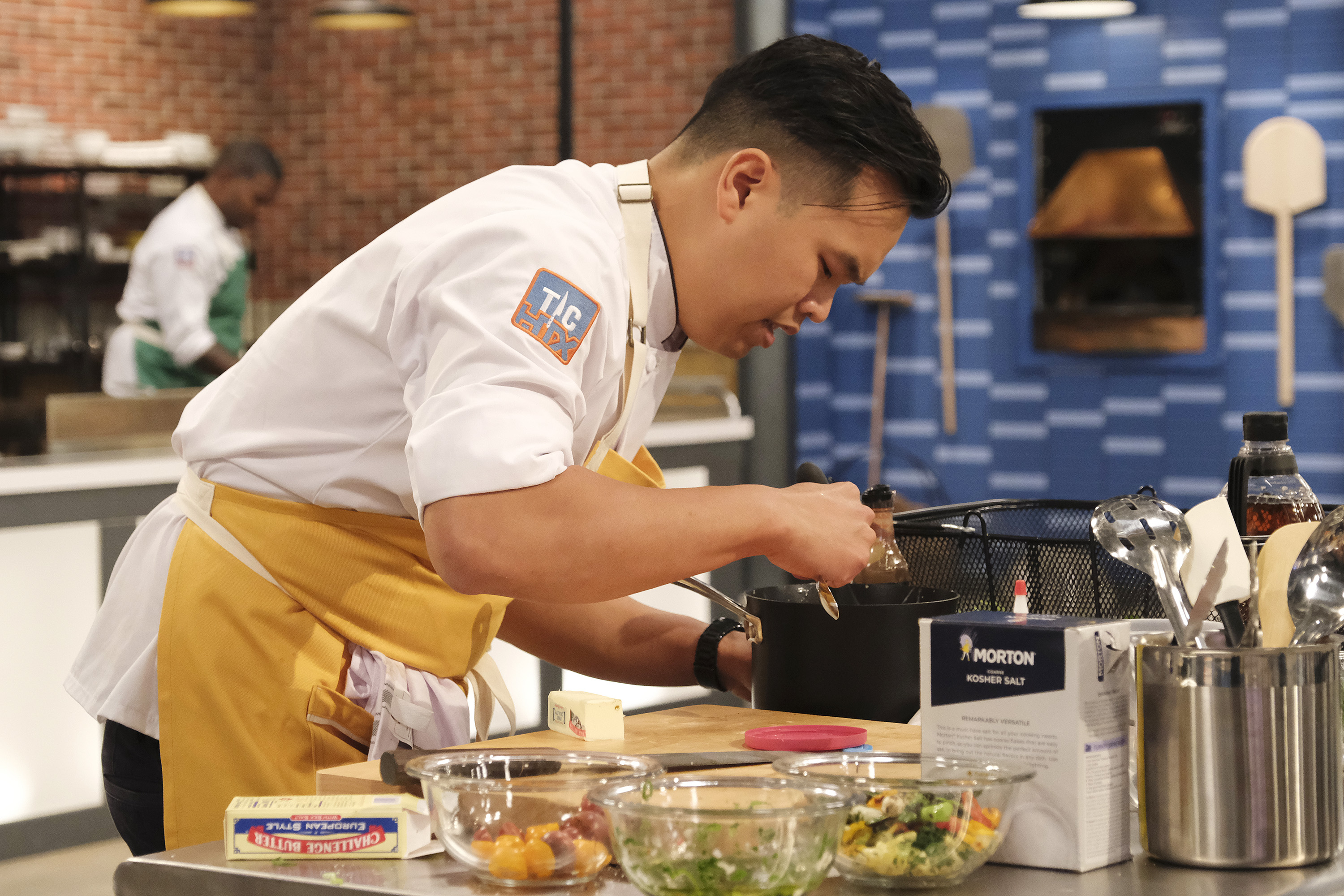 "Top Chef" winner Buddha Lo puts his head down and gets to work.