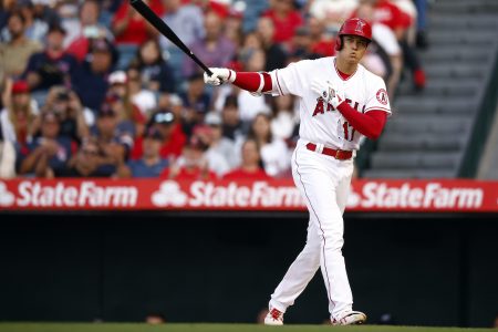 Shohei Ohtani of the Los Angeles Angels strikes out against the Boston Red Sox in the first inning at Angel Stadium of Anaheim on June 08, 2022 .