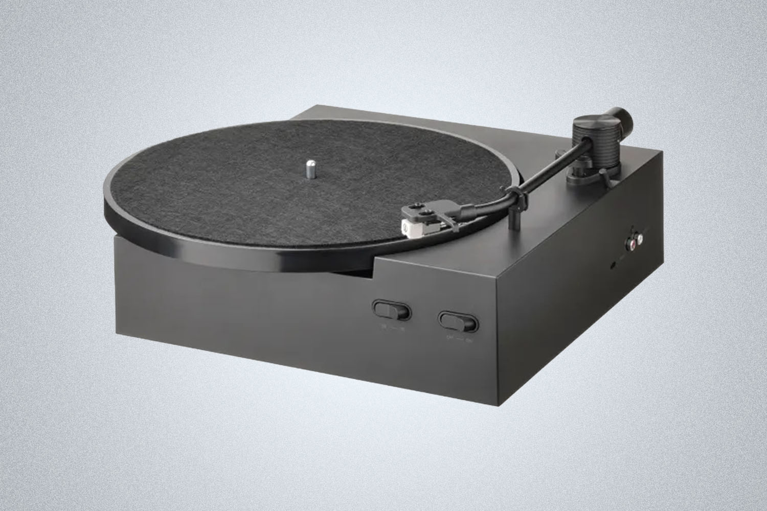 a black Ikea turntable on a gray background