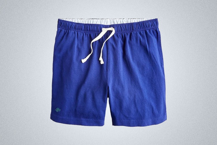 a pair of electric blue 7" rugby shorts from J.Crew on a grey background